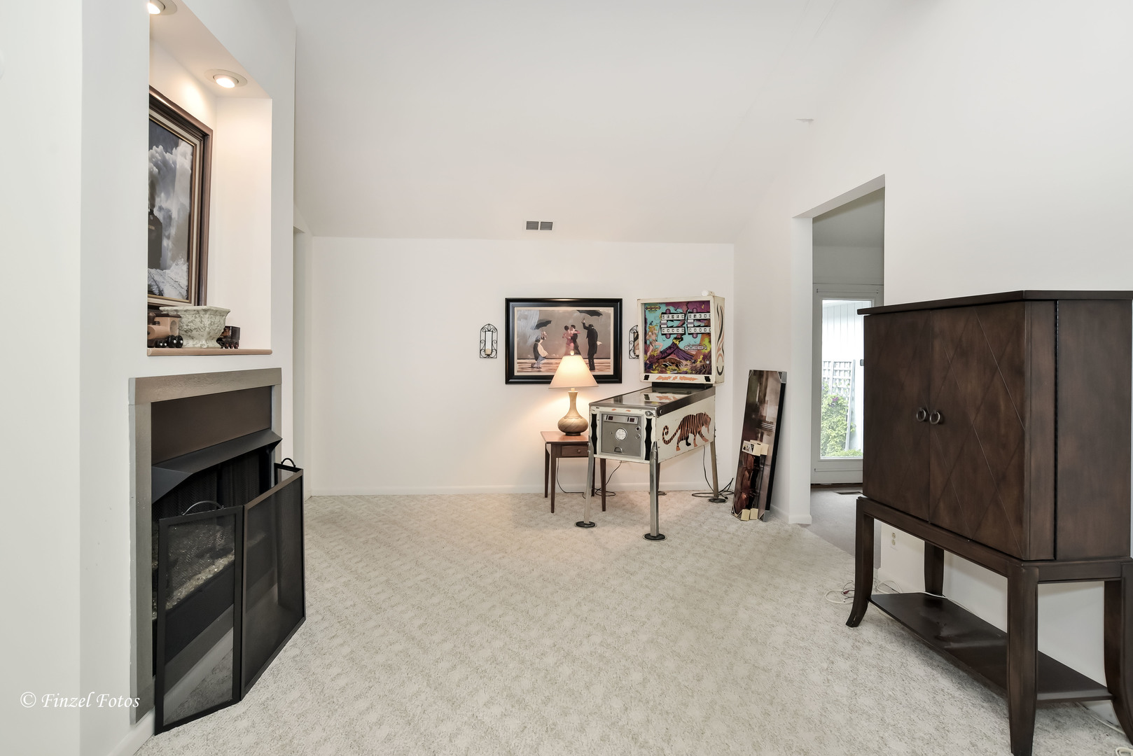 1817 Orchard Lane McHenry, IL 60050 - Photo 4 of 20 a living room with furniture and a refrigerator