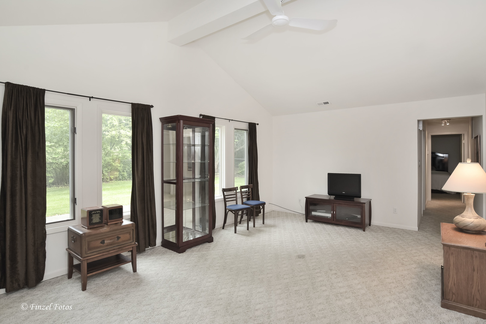 1817 Orchard Lane McHenry, IL 60050 - Photo 9 of 20 a living room with furniture and large windows