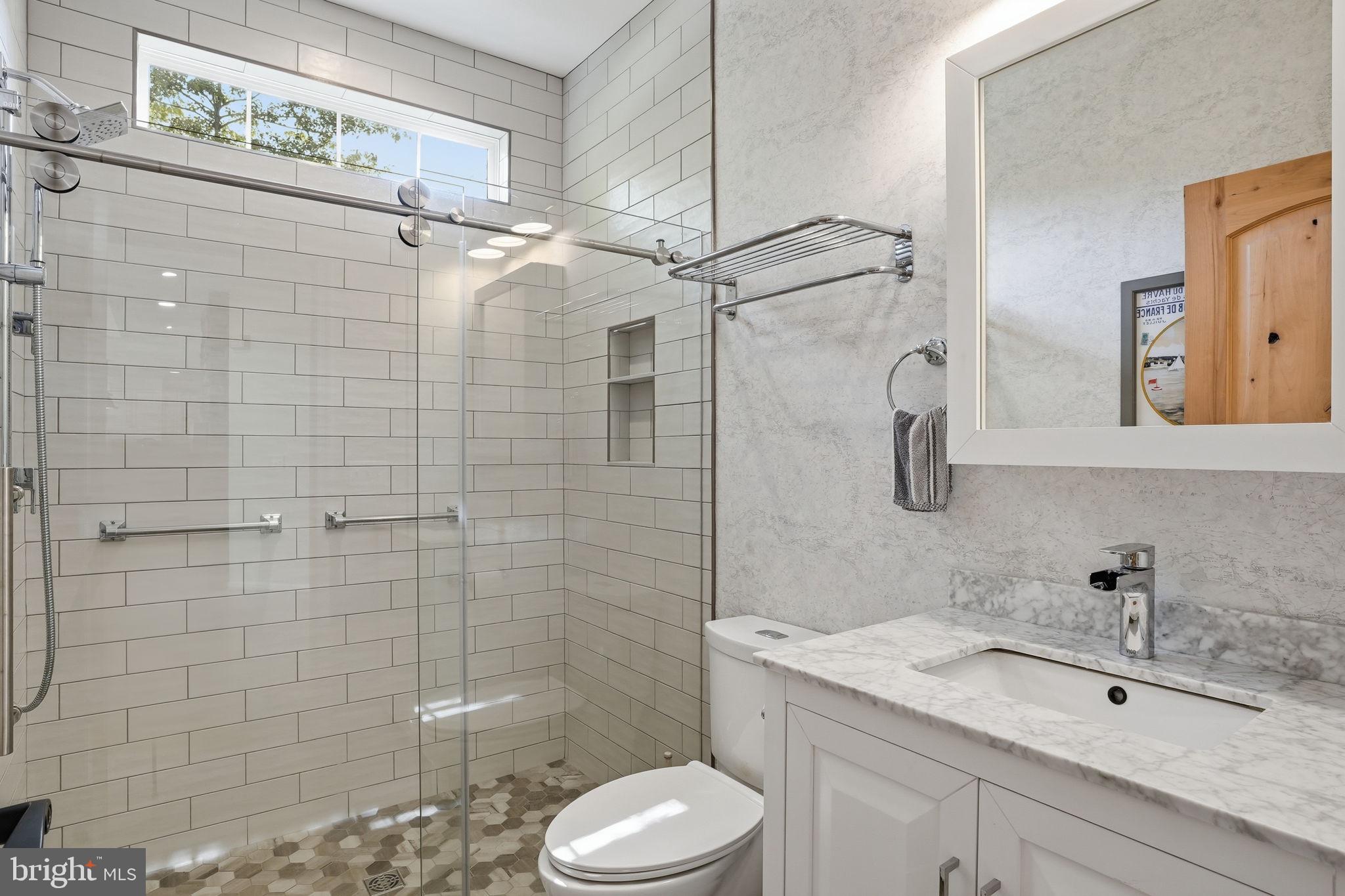 1567 Comanche Road Arnold, MD 21012 - Photo 16 of 67 Sleek modern bathroom oasis.