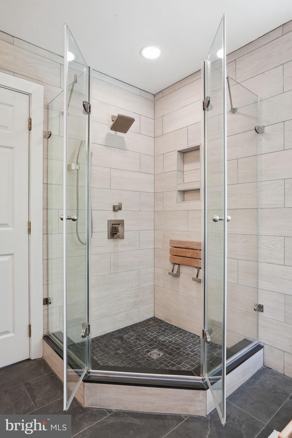 1567 Comanche Road Arnold, MD 21012 - Photo 23 of 67 Sleek glass shower for modern living.