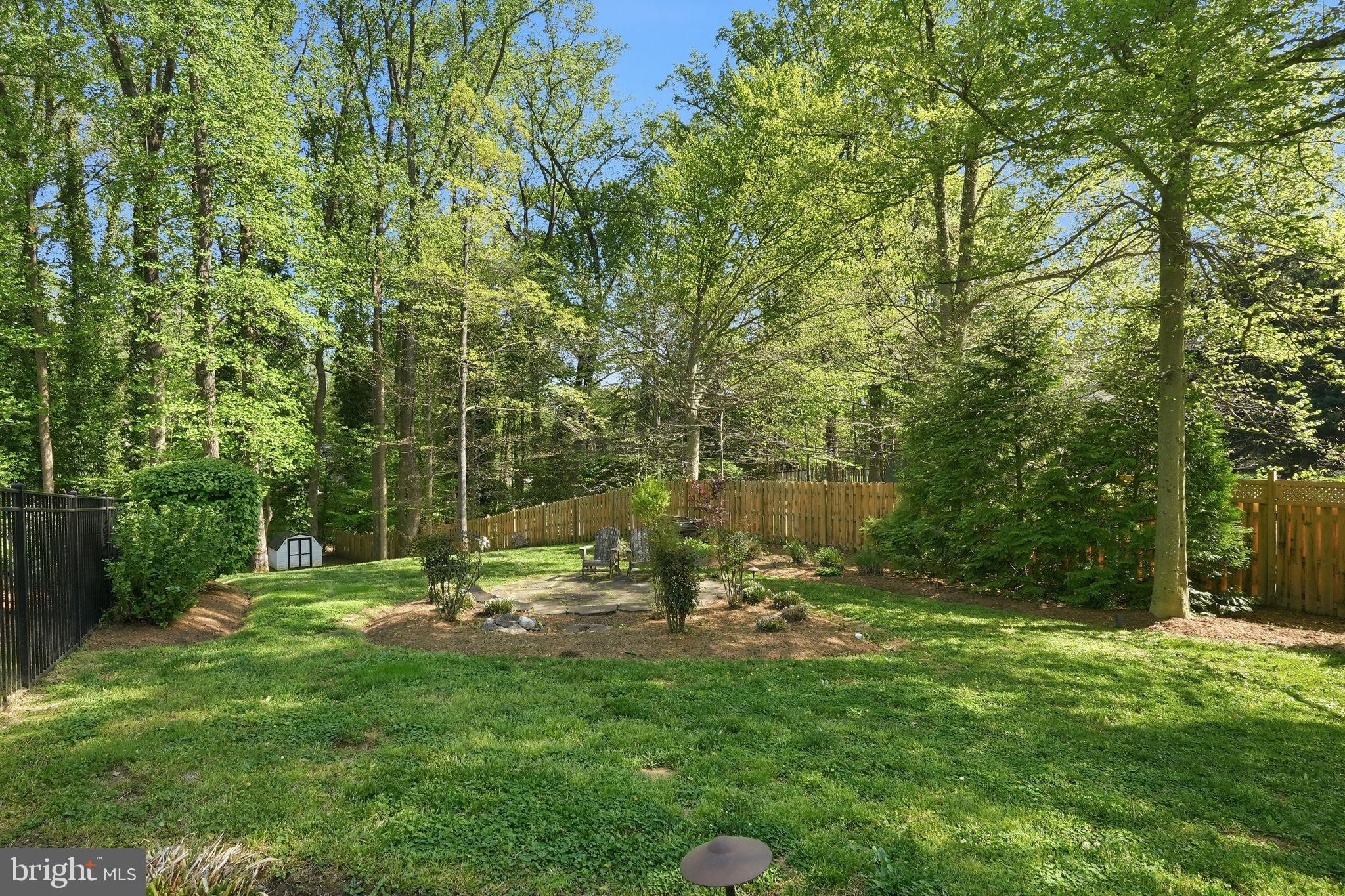 1567 Comanche Road Arnold, MD 21012 - Photo 46 of 67 Serene backyard oasis in lush greenery.