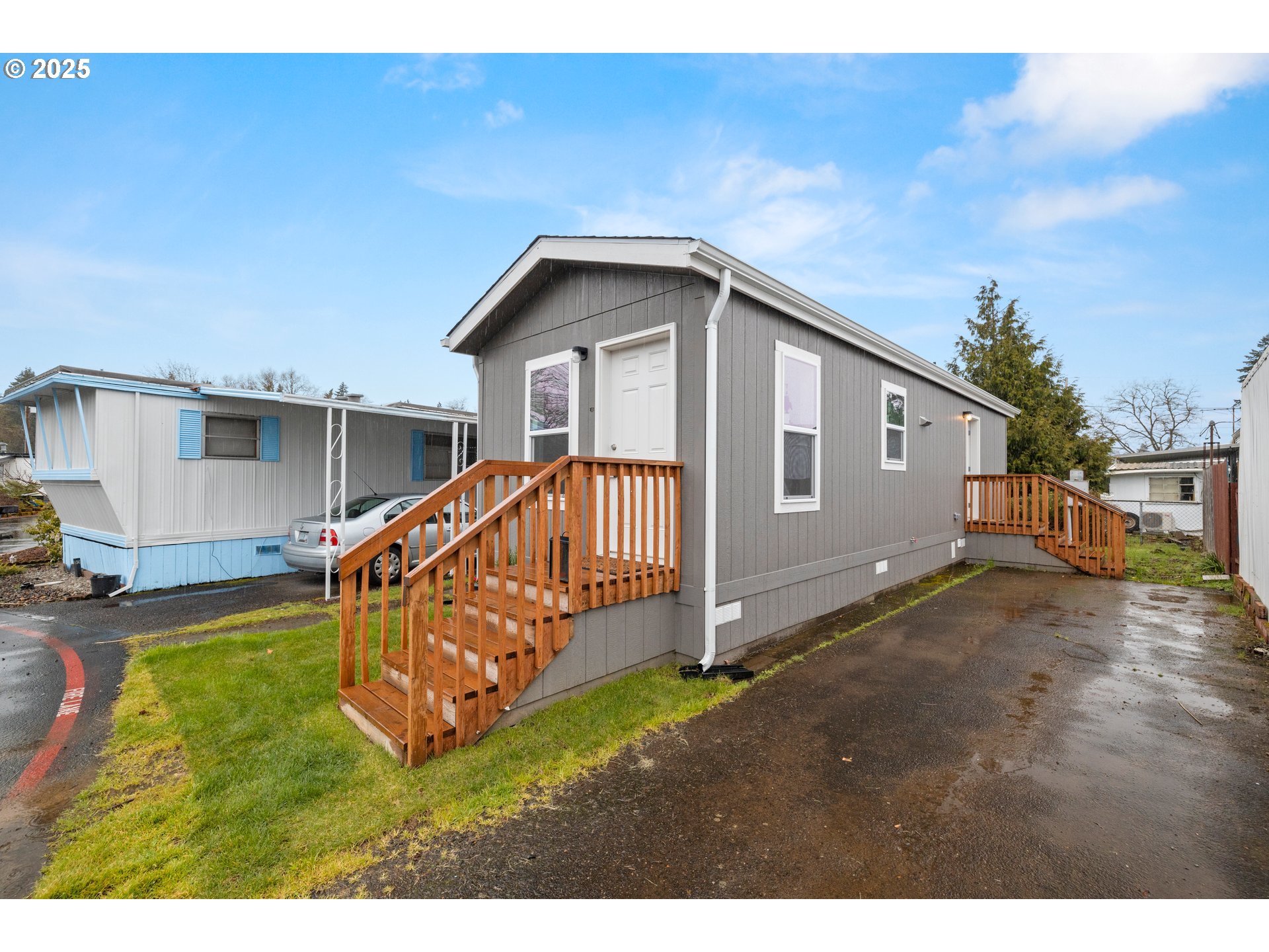 19605 River Road, Unit 88 Gladstone, OR 97027 - Photo 1 of 25 a view of a house with a yard