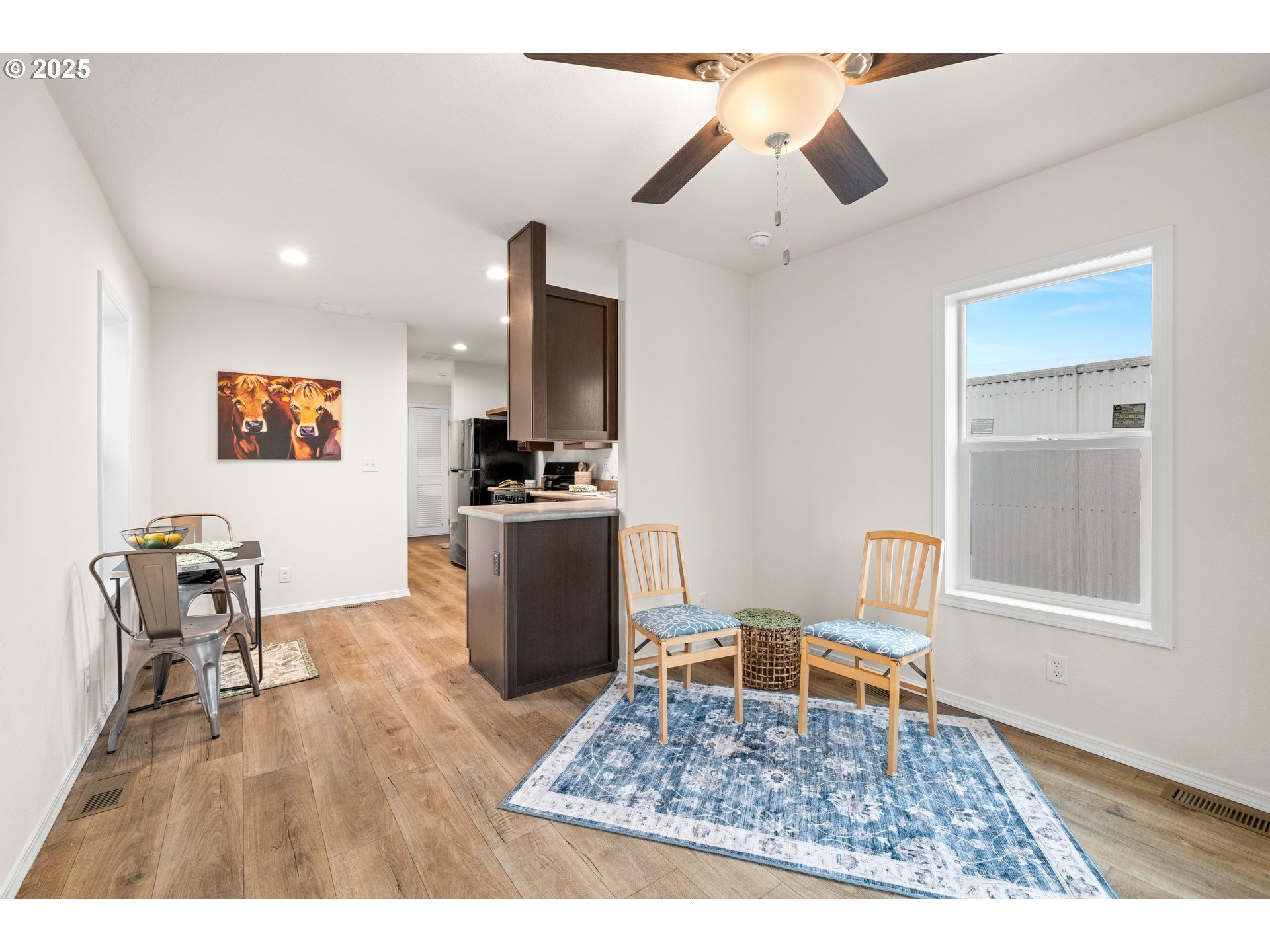 19605 River Road, Unit 88 Gladstone, OR 97027 - Photo 11 of 25 a living room with furniture and a rug