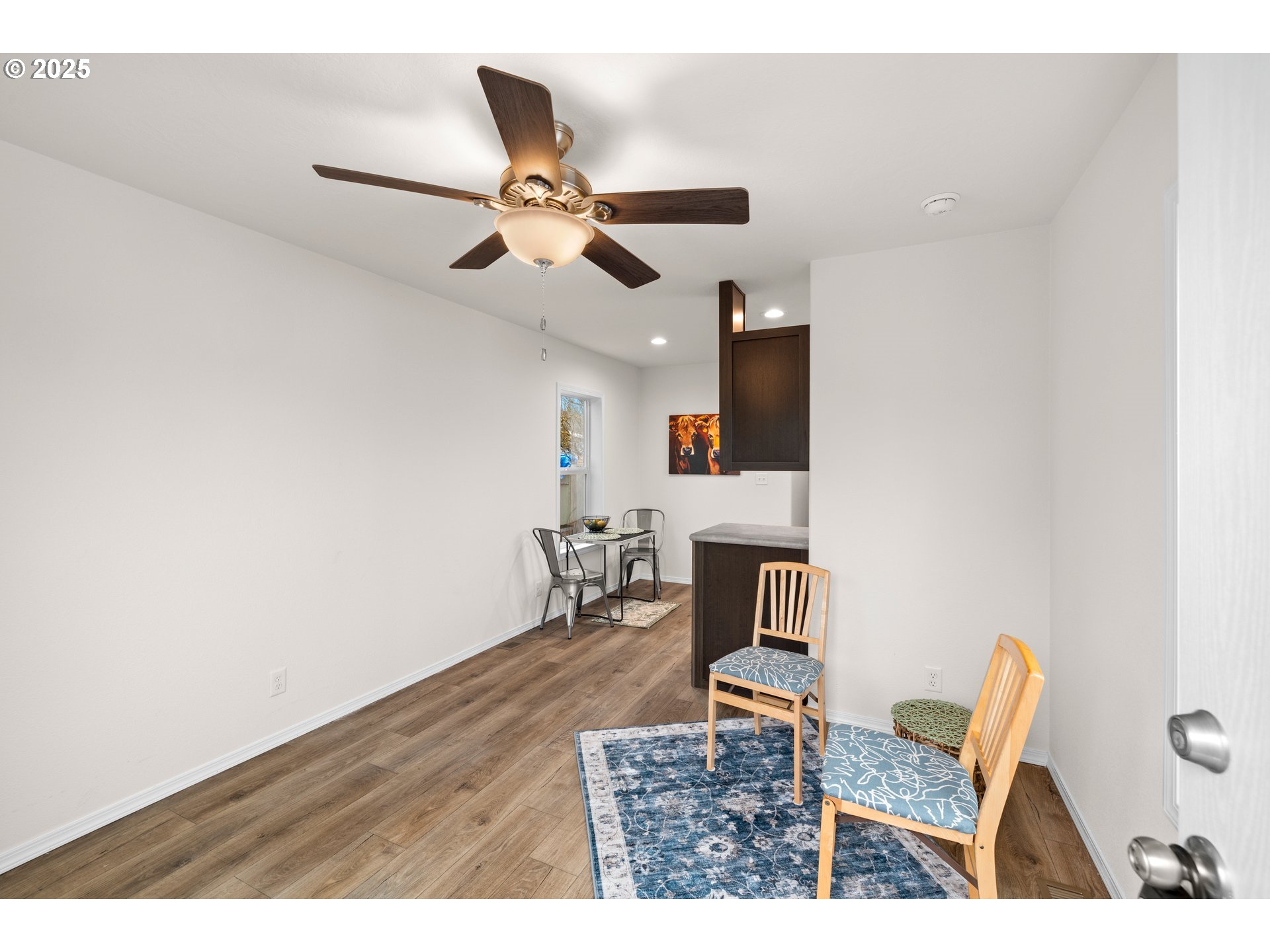 19605 River Road, Unit 88 Gladstone, OR 97027 - Photo 13 of 25 a living room with furniture and a wooden floor