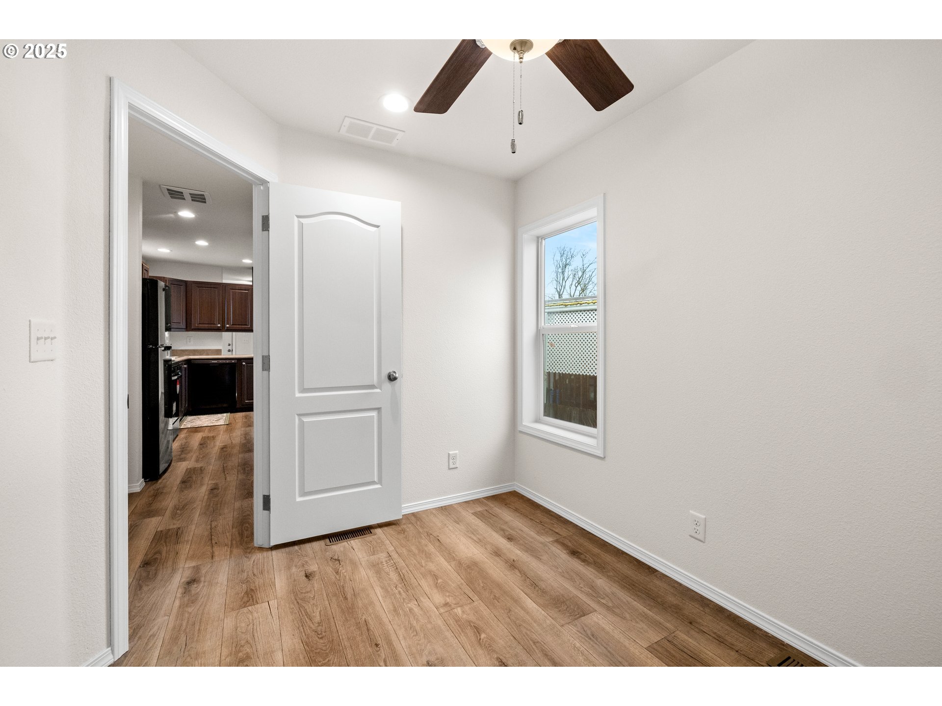 19605 River Road, Unit 88 Gladstone, OR 97027 - Photo 16 of 25 wooden floor in an empty room