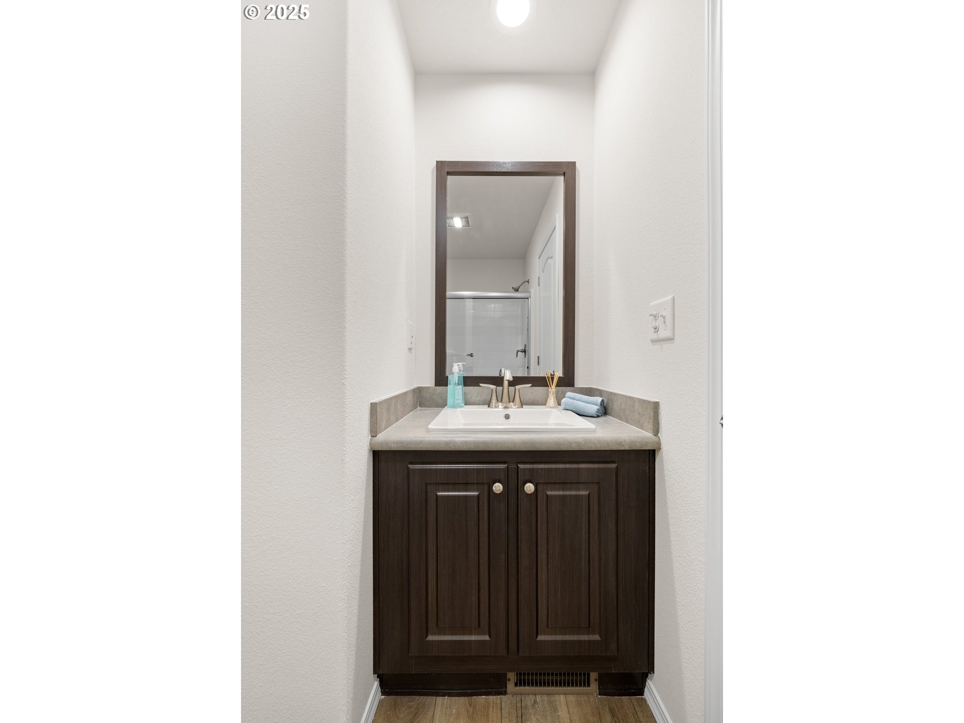 19605 River Road, Unit 88 Gladstone, OR 97027 - Photo 20 of 25 a bathroom with a sink and a mirror