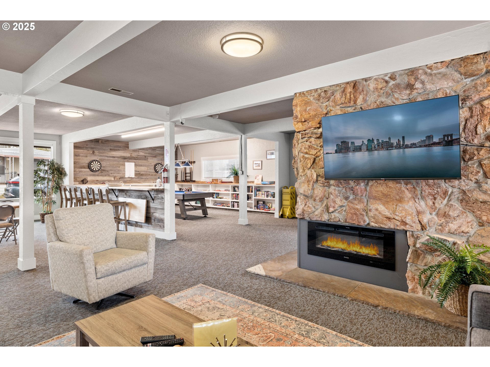 19605 River Road, Unit 88 Gladstone, OR 97027 - Photo 23 of 25 a living room with furniture and a fireplace