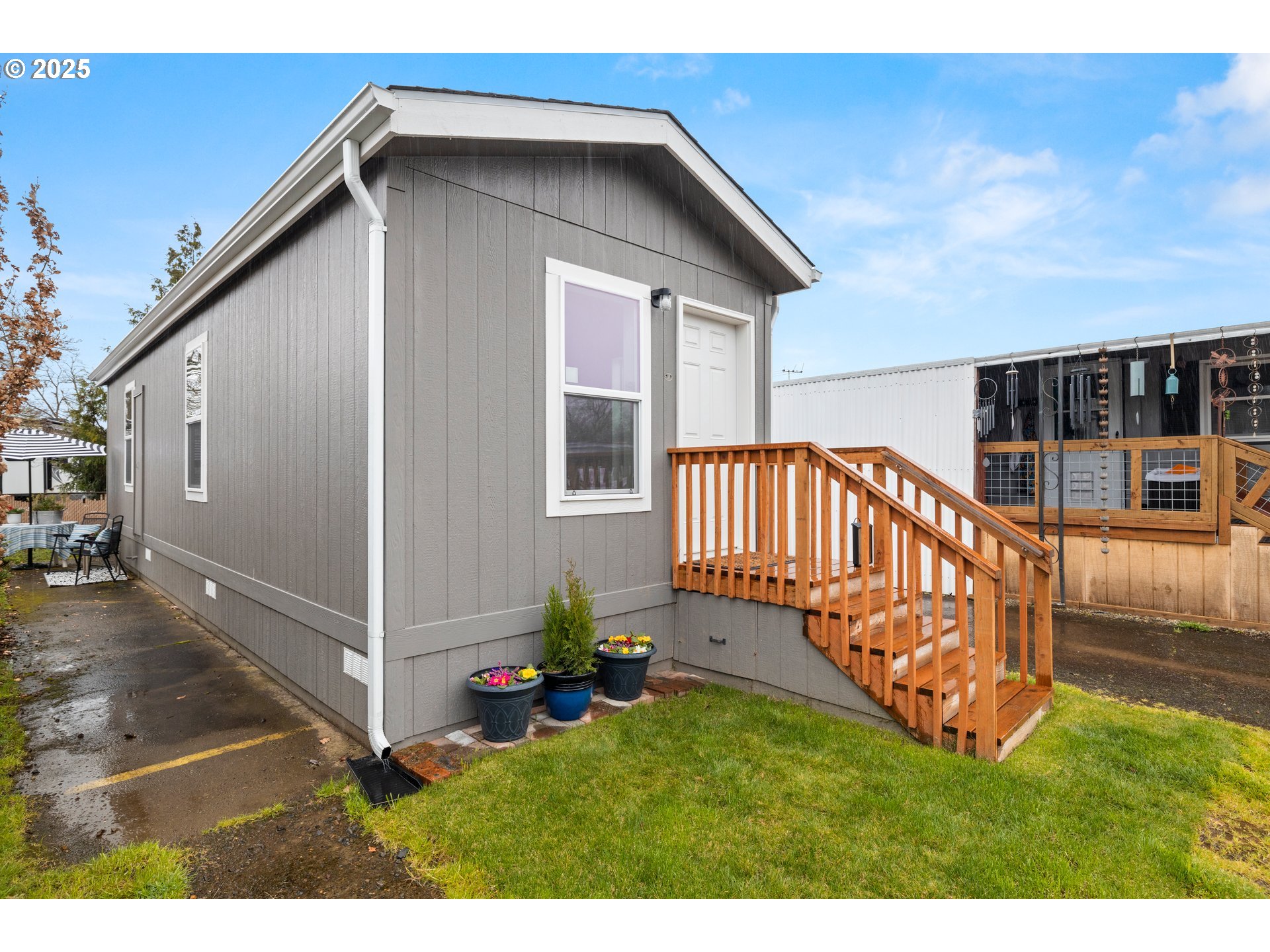 19605 River Road, Unit 88 Gladstone, OR 97027 - Photo 4 of 25 a view of a house with a yard
