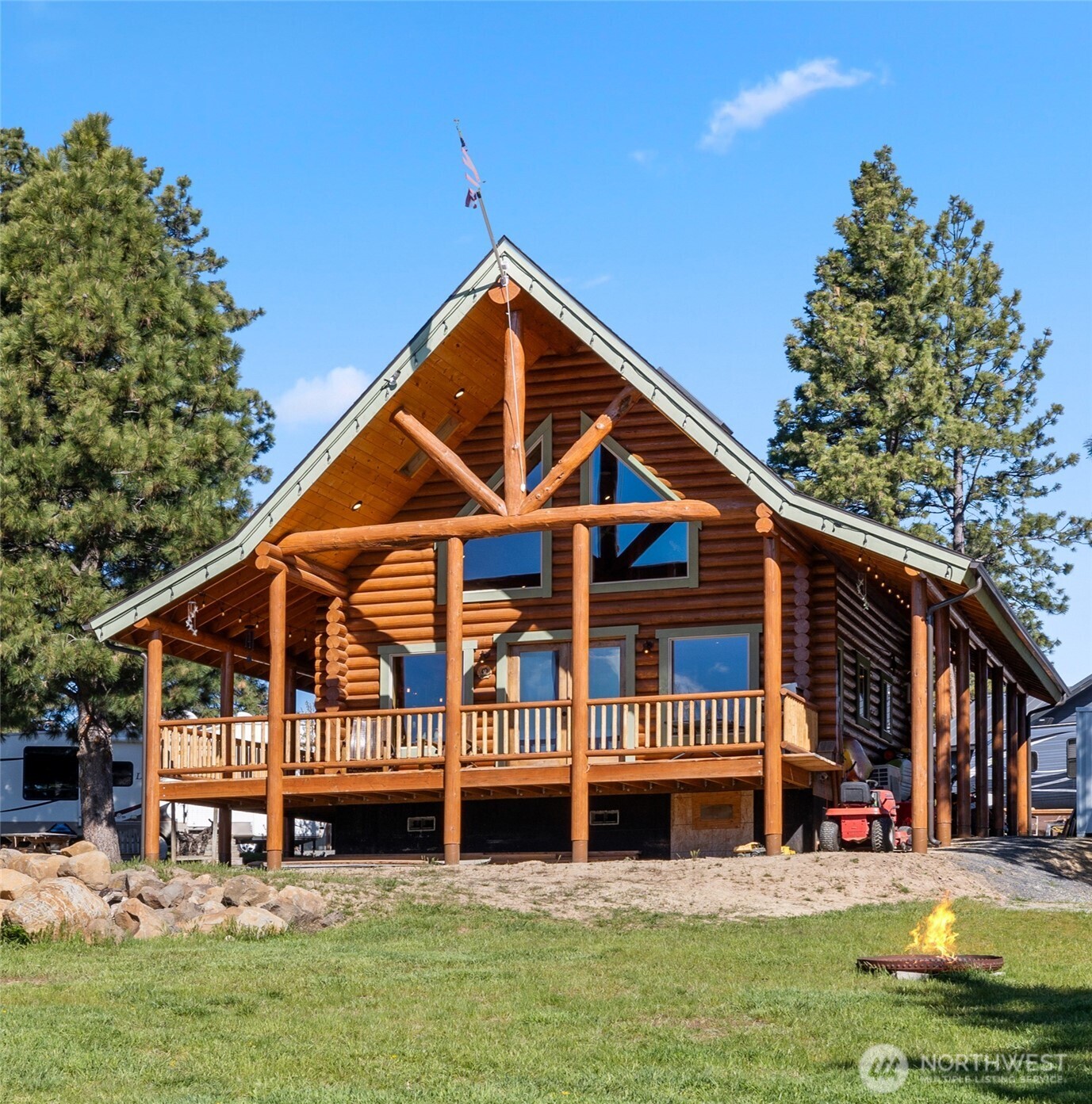 351 Ridge Loop Road Cle Elum, WA 98922 - Photo 1 of 38 a view of house with yard and swimming pool