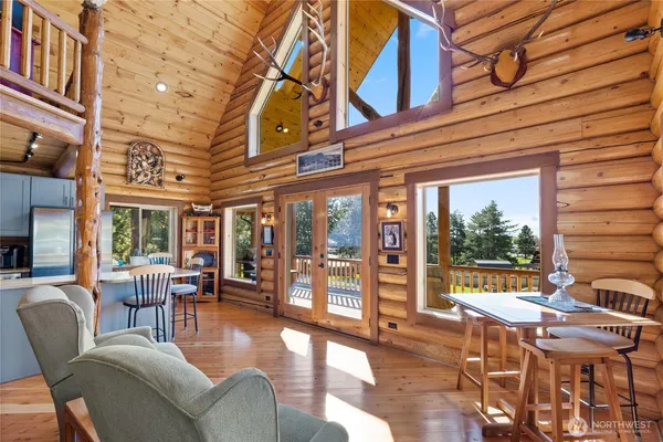 a view of a building with furniture