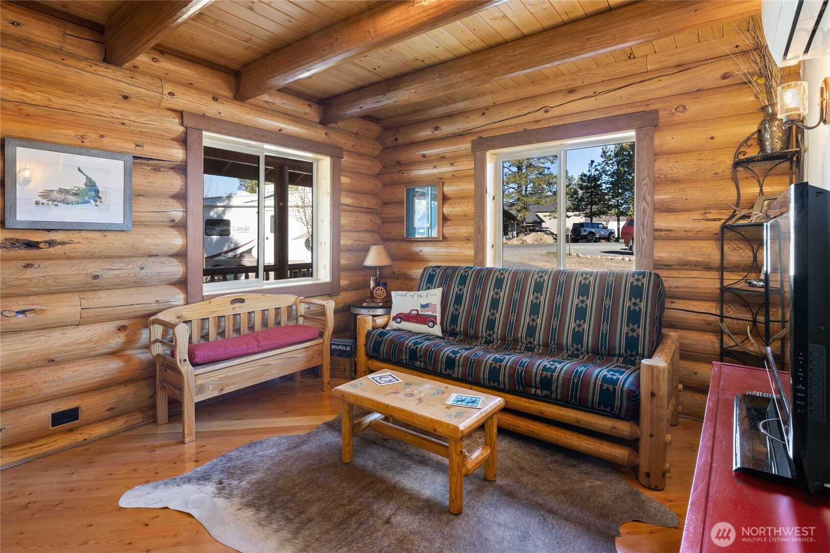 351 Ridge Loop Road Cle Elum, WA 98922 - Photo 24 of 38 a bedroom with furniture and a wooden floor