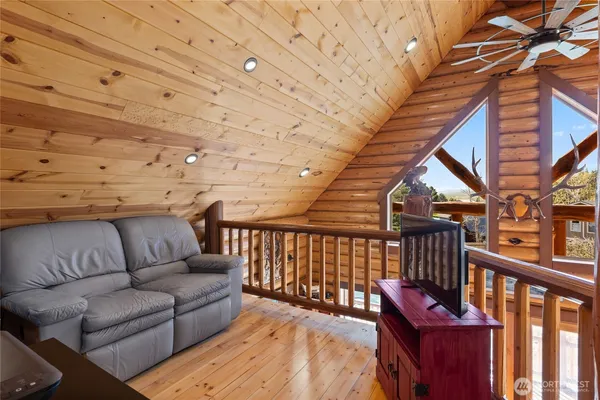 a view of a balcony with furniture