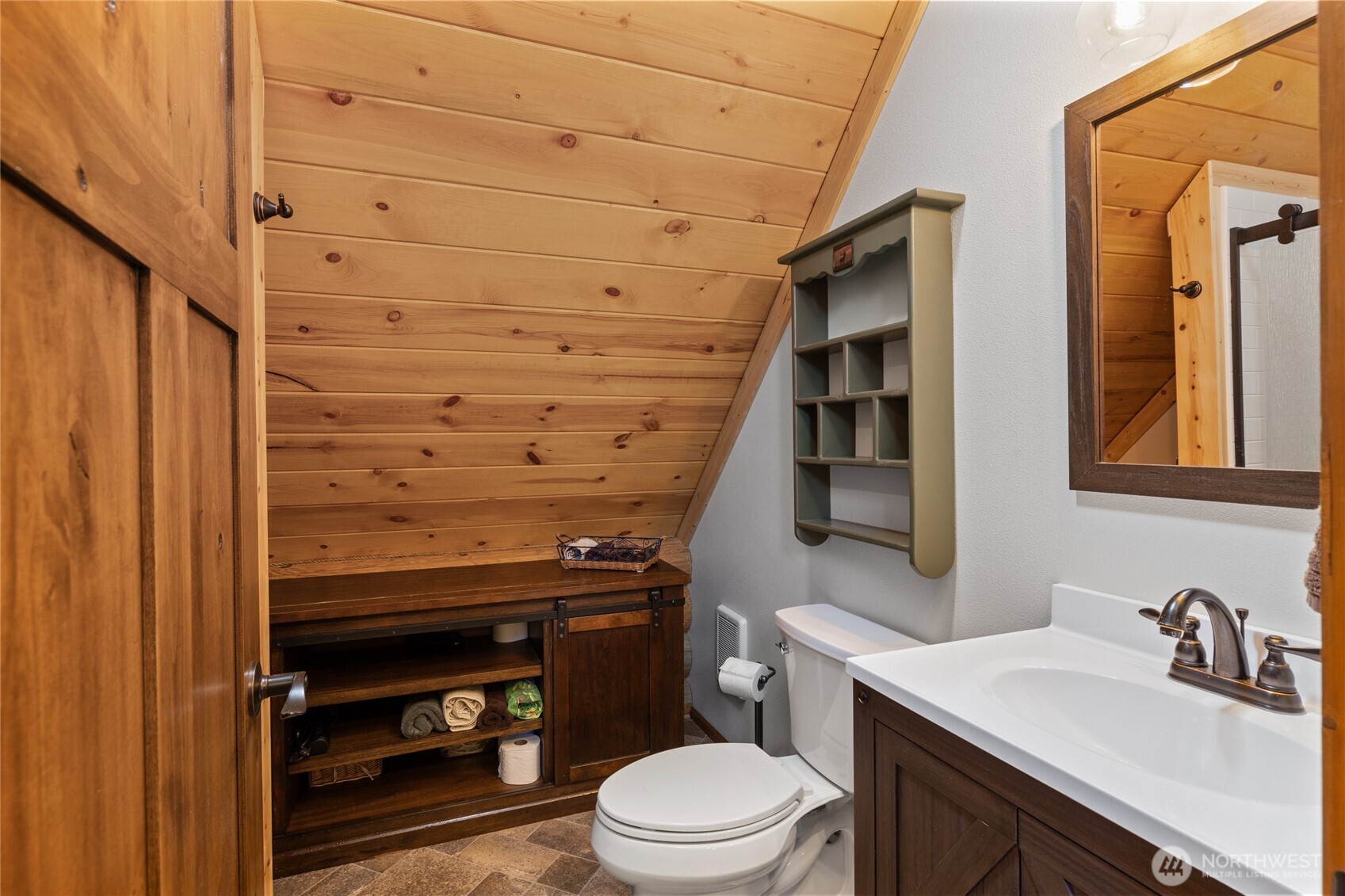 351 Ridge Loop Road Cle Elum, WA 98922 - Photo 31 of 38 a bathroom with a sink a toilet and vanity