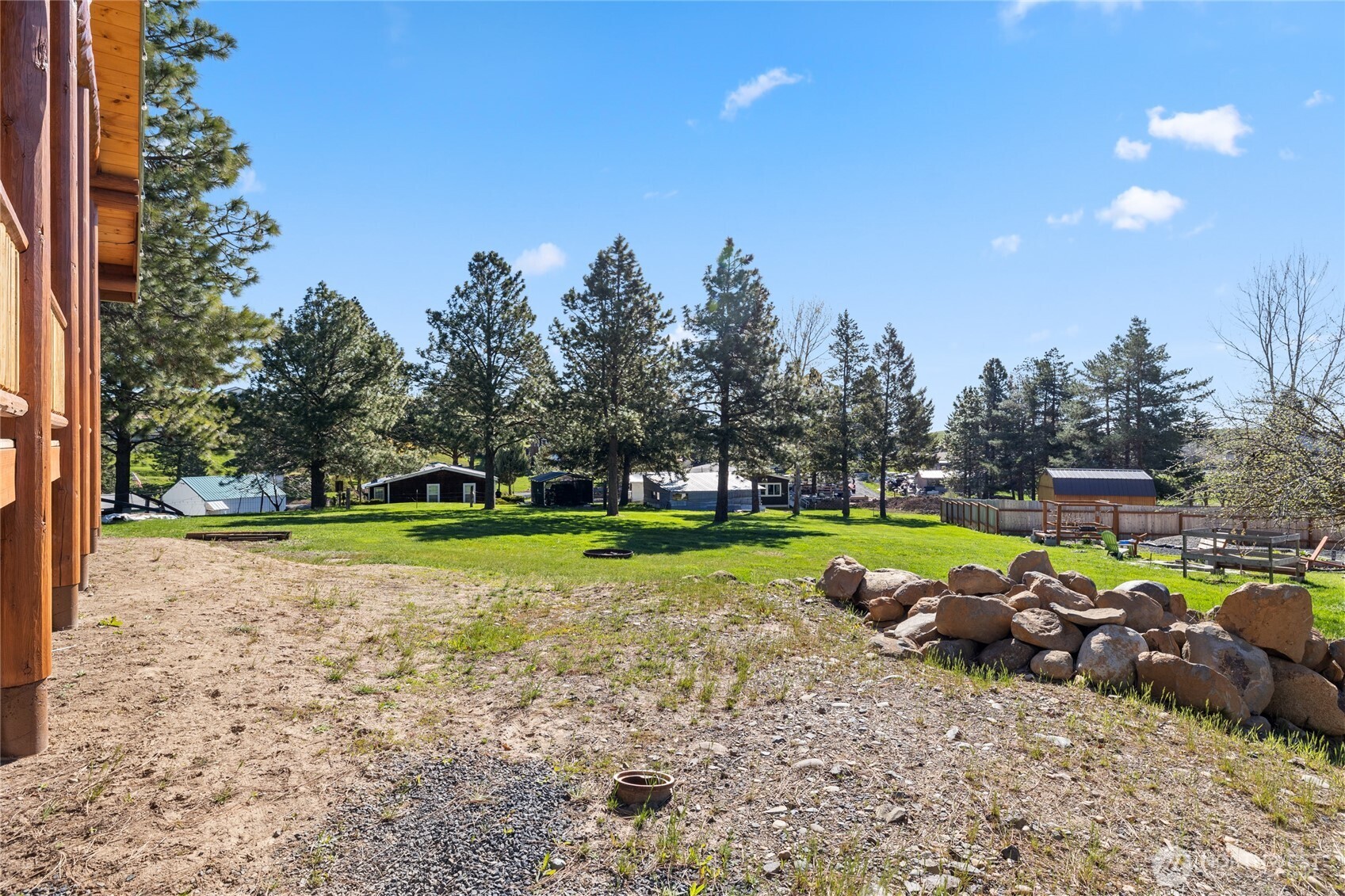 351 Ridge Loop Road Cle Elum, WA 98922 - Photo 33 of 38 a view of swimming pool with lawn chairs and a yard