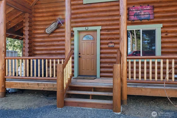 a view of a porch with a bench