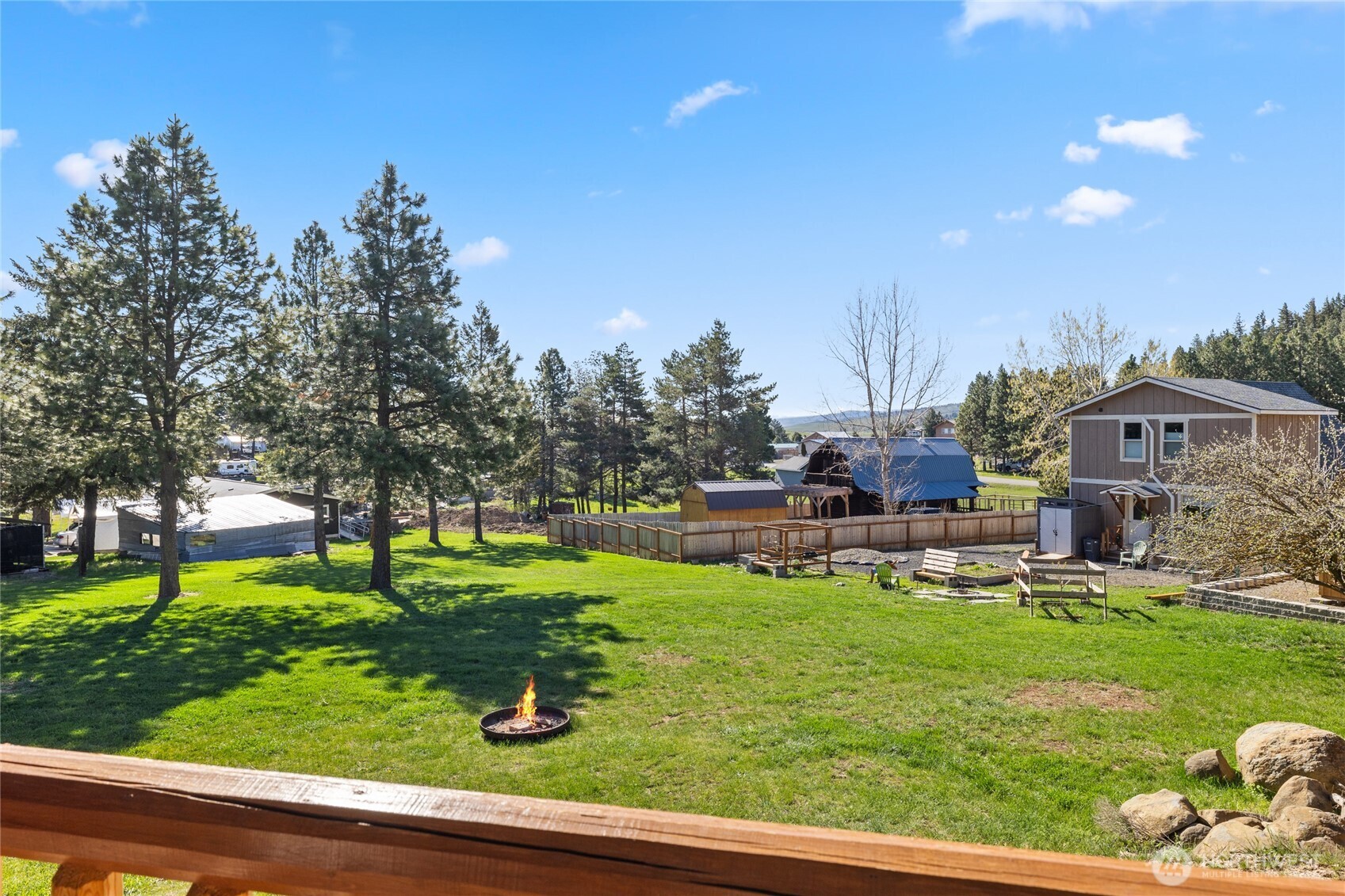 351 Ridge Loop Road Cle Elum, WA 98922 - Photo 9 of 38 a house view with a sitting space and garden