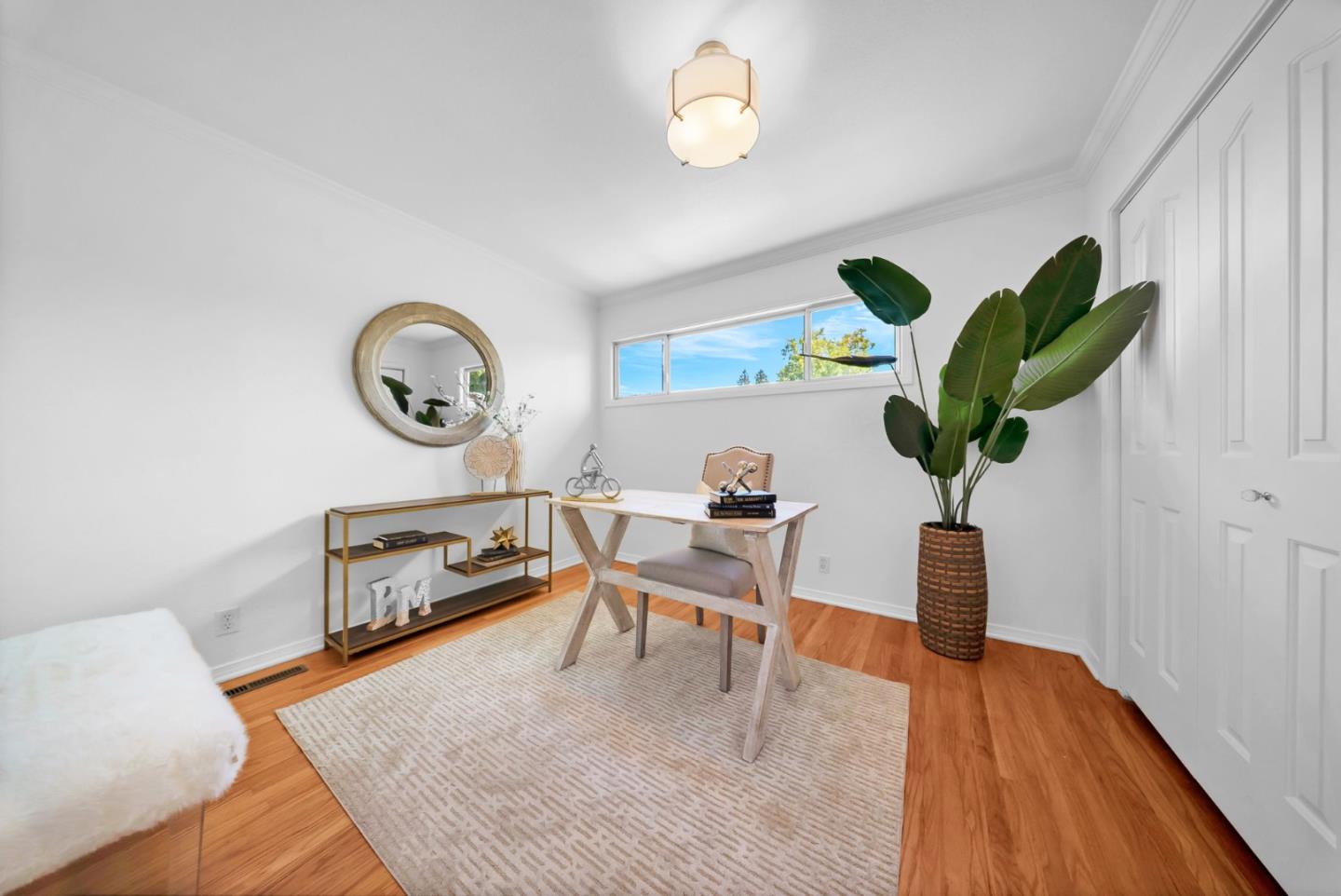 180 Coventry Drive Campbell, CA 95008 - Photo 25 of 44 a living room with furniture a window and a clock