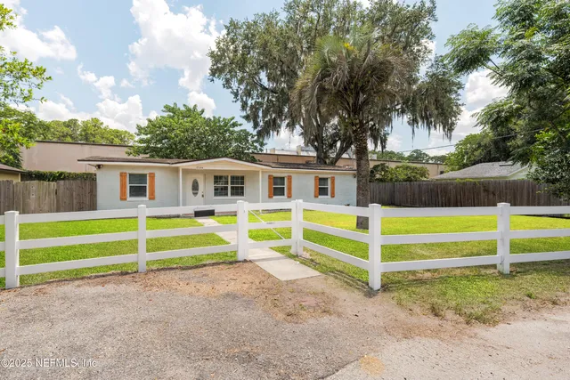 a view of a backyard with a garden