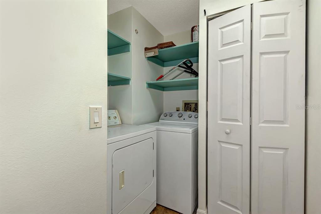 5645 Summerside Lane, Unit 40B Sarasota, FL 34231 - Photo 20 of 23 a room with storage and utility
