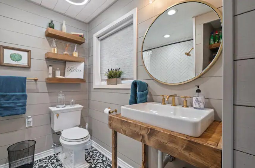 4709 Lido Lane Houston, TX 77092 - Photo 12 of 19 a bathroom with a sink toilet and mirror