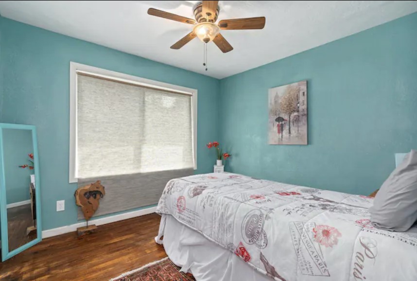 4709 Lido Lane Houston, TX 77092 - Photo 14 of 19 a bedroom with a bed and a window