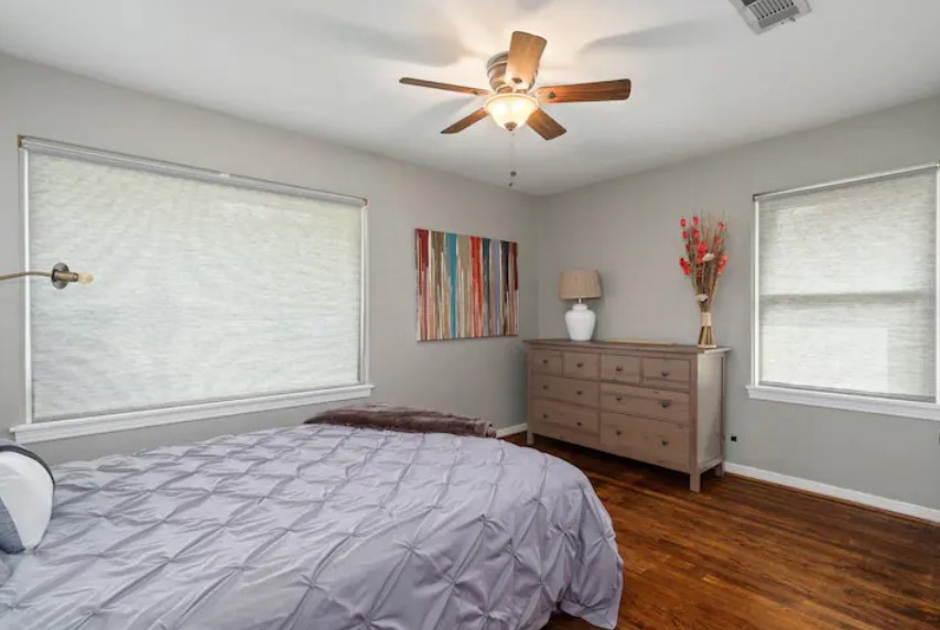 4709 Lido Lane Houston, TX 77092 - Photo 16 of 19 a bedroom with a bed dresser and a window
