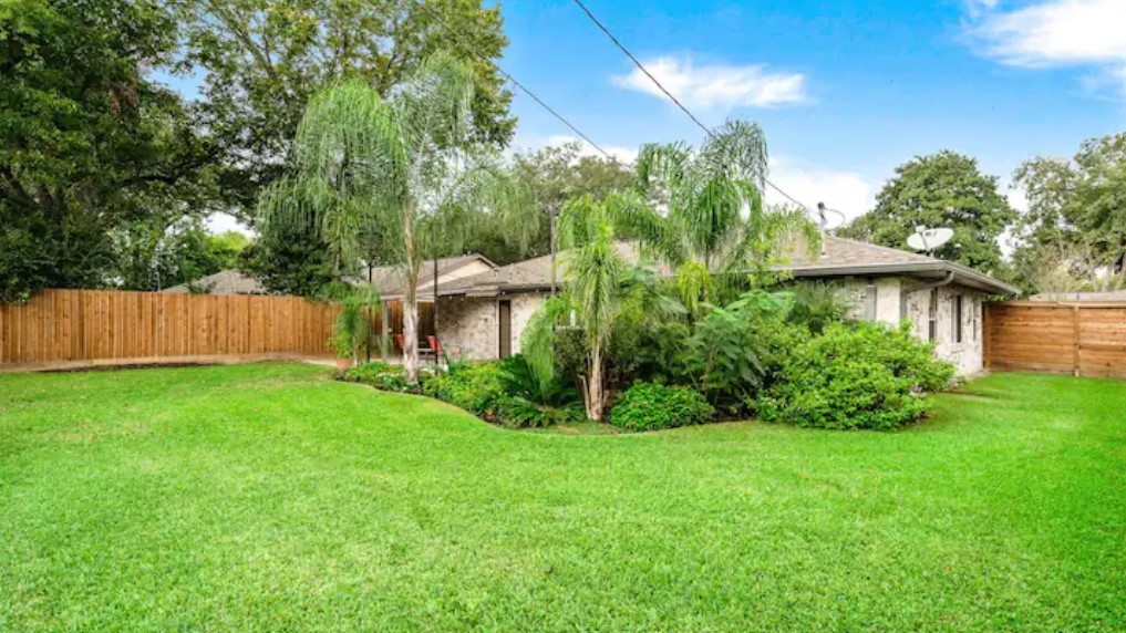 4709 Lido Lane Houston, TX 77092 - Photo 17 of 19 a view of a house with a yard