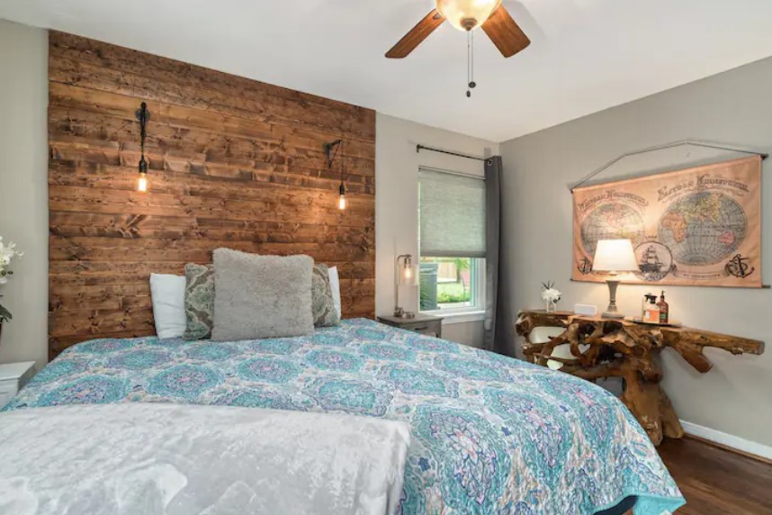 4709 Lido Lane Houston, TX 77092 - Photo 10 of 19 a large bed sitting in a bedroom next to a window