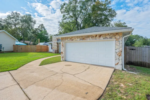 a view of backyard with green space
