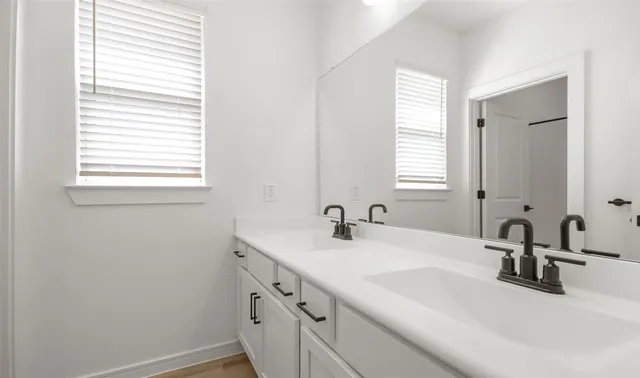 a view of a room with wooden floor and small space