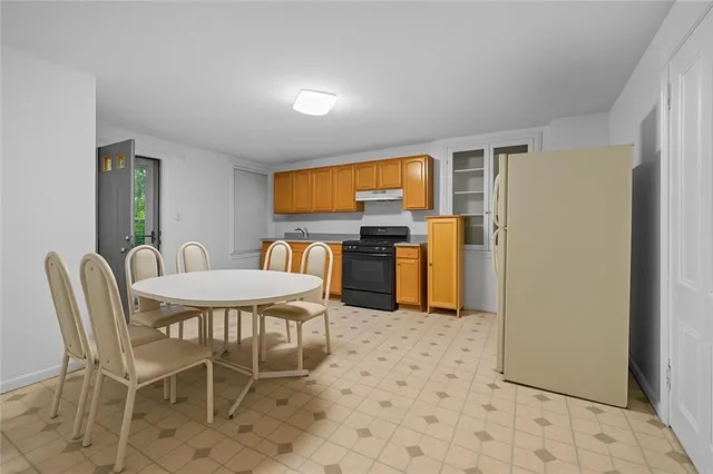 a bathroom with a toilet and a sink