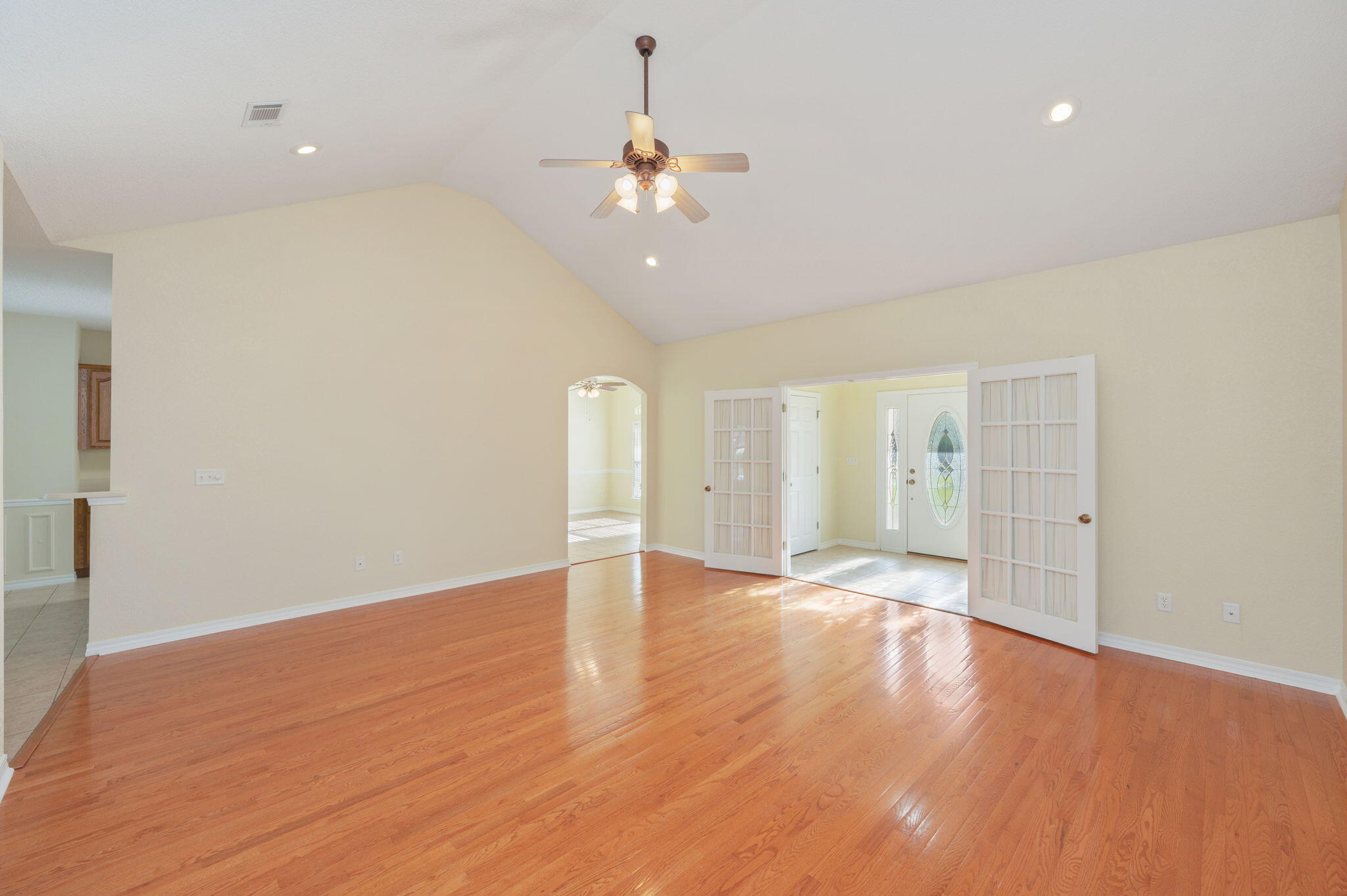 5552 Frontier Drive Crestview, FL 32536 - Photo 9 of 50 wooden floor in an empty room with a window
