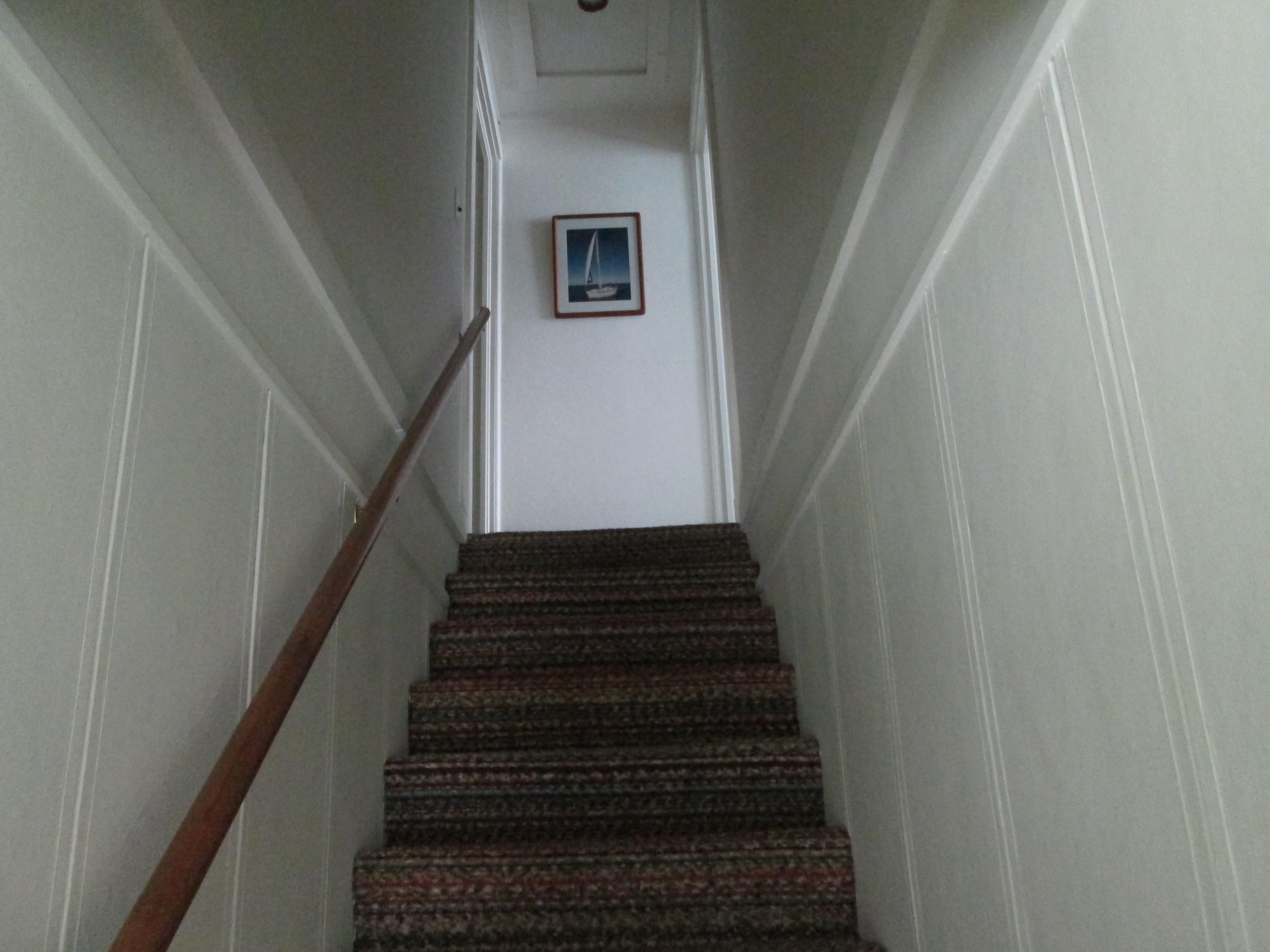 605 Foote Road Cheboygan, MI 49721 - Photo 21 of 35 CARPETED STAIRWAY