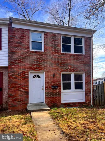 a view of a house with a door and garage