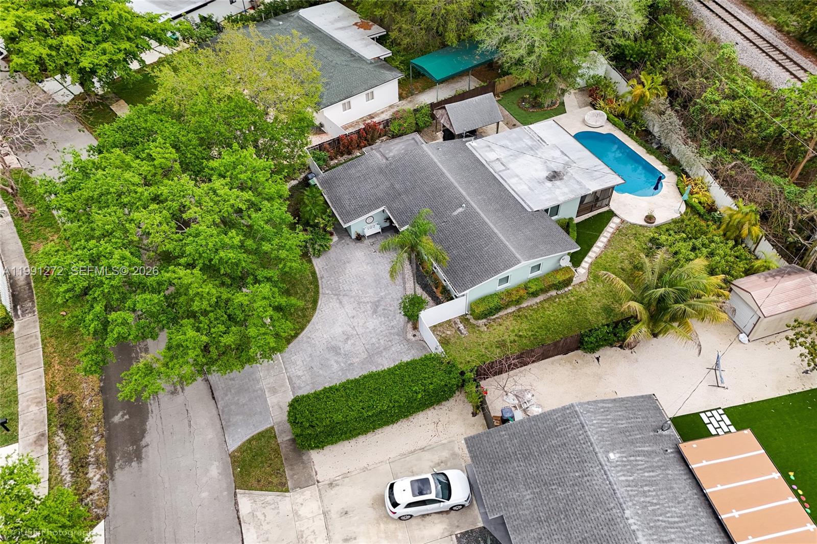 8535 Southwest 97th Road Miami, FL 33173 - Photo 26 of 28 an aerial view of a house with garden space and street view