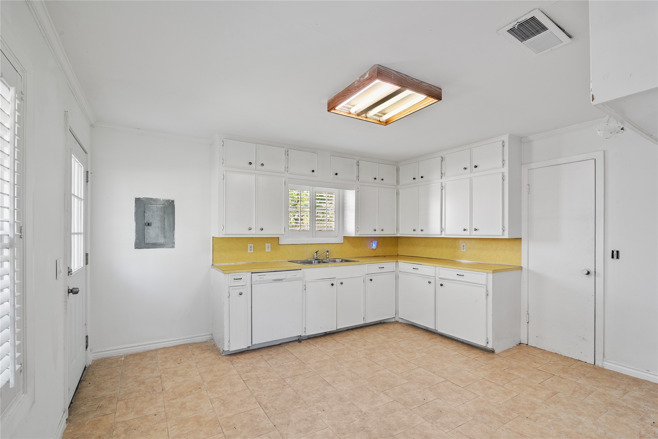 36622 Tompkins Road Hempstead, TX 77445 - Photo 20 of 46 a view of a kitchen with wooden floor and a sink