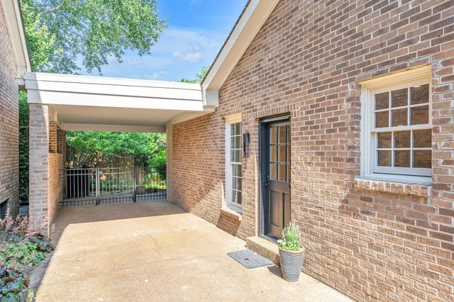 a front view of a house with a porch