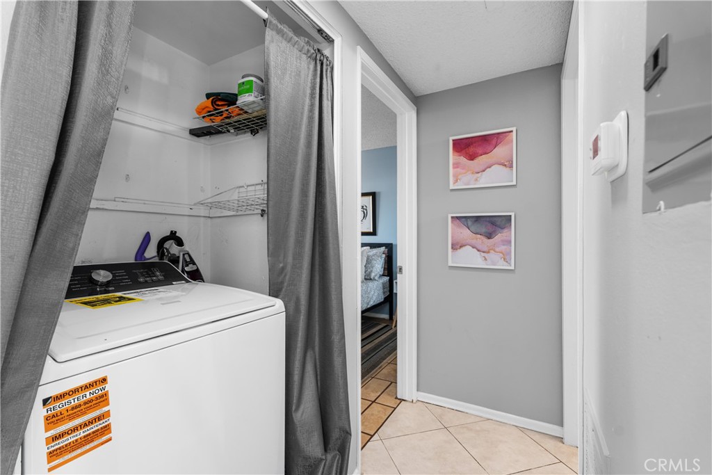 69646 Antonia Way Rancho Mirage, CA 92270 - Photo 29 of 50 a utility room with dryer and washer