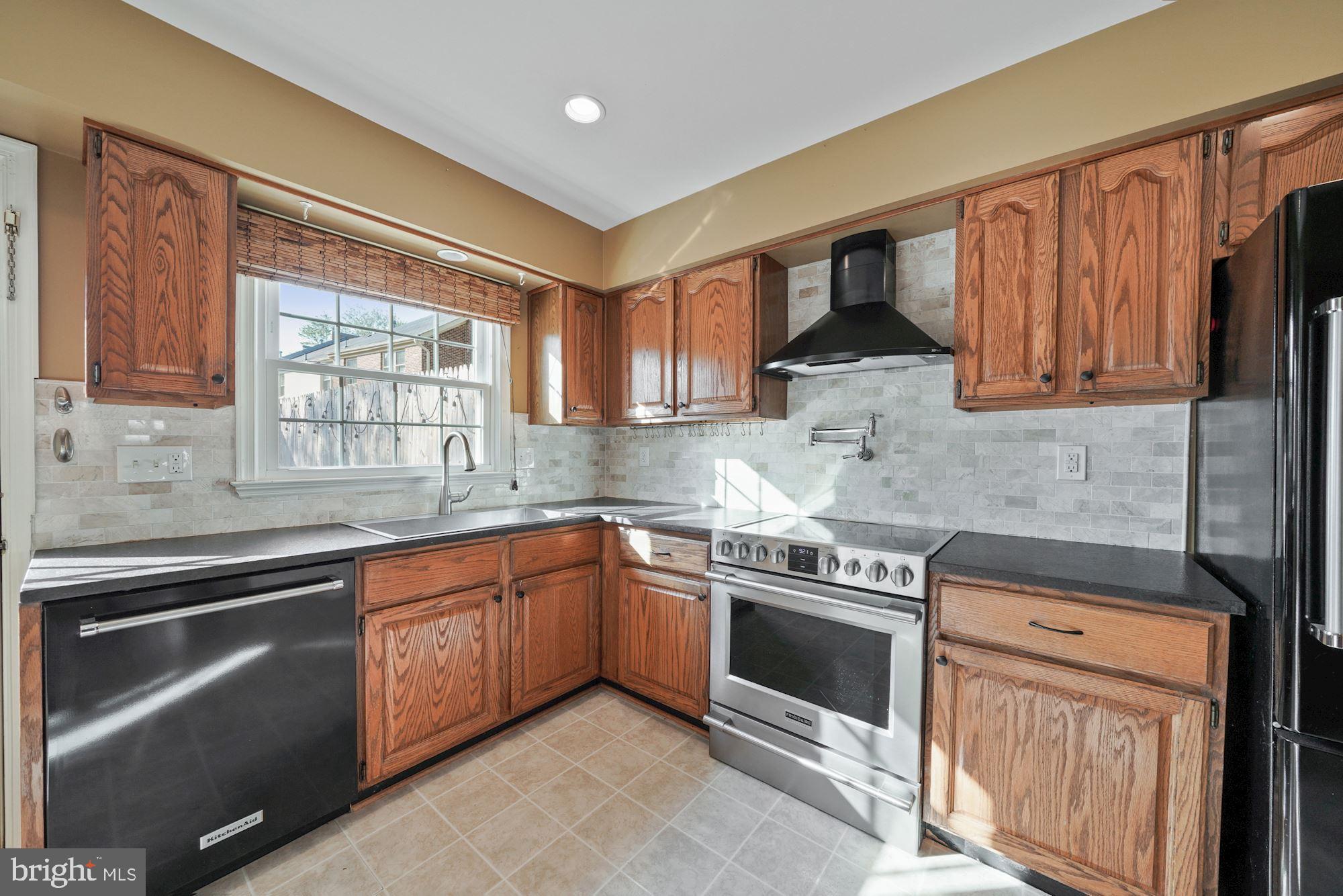 8519 Forrester Boulevard Springfield, VA 22152 - Photo 4 of 44 Kitchen