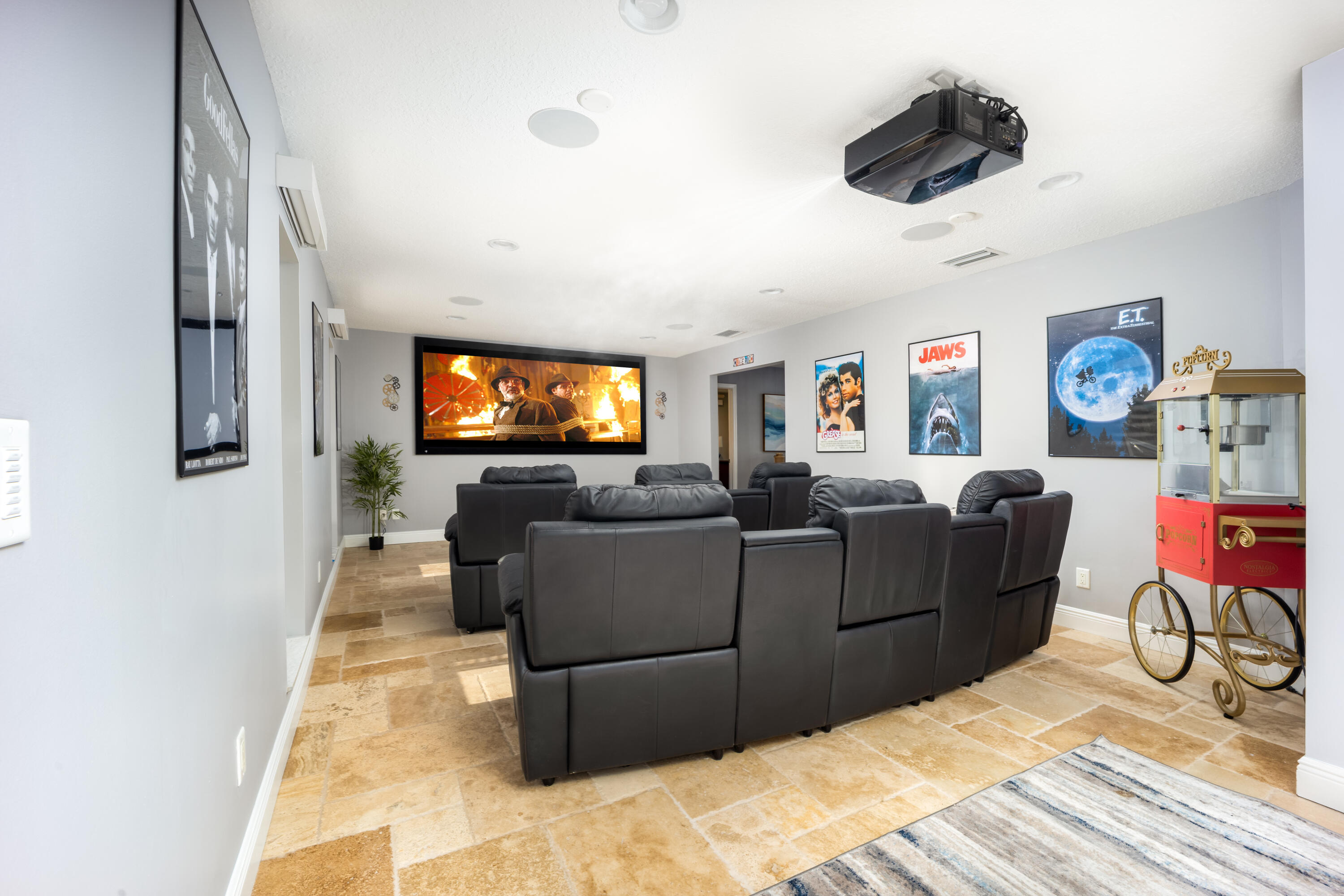 3771 Southeast Fairway West Stuart, FL 34997 - Photo 16 of 41 a living room with furniture and a flat screen tv