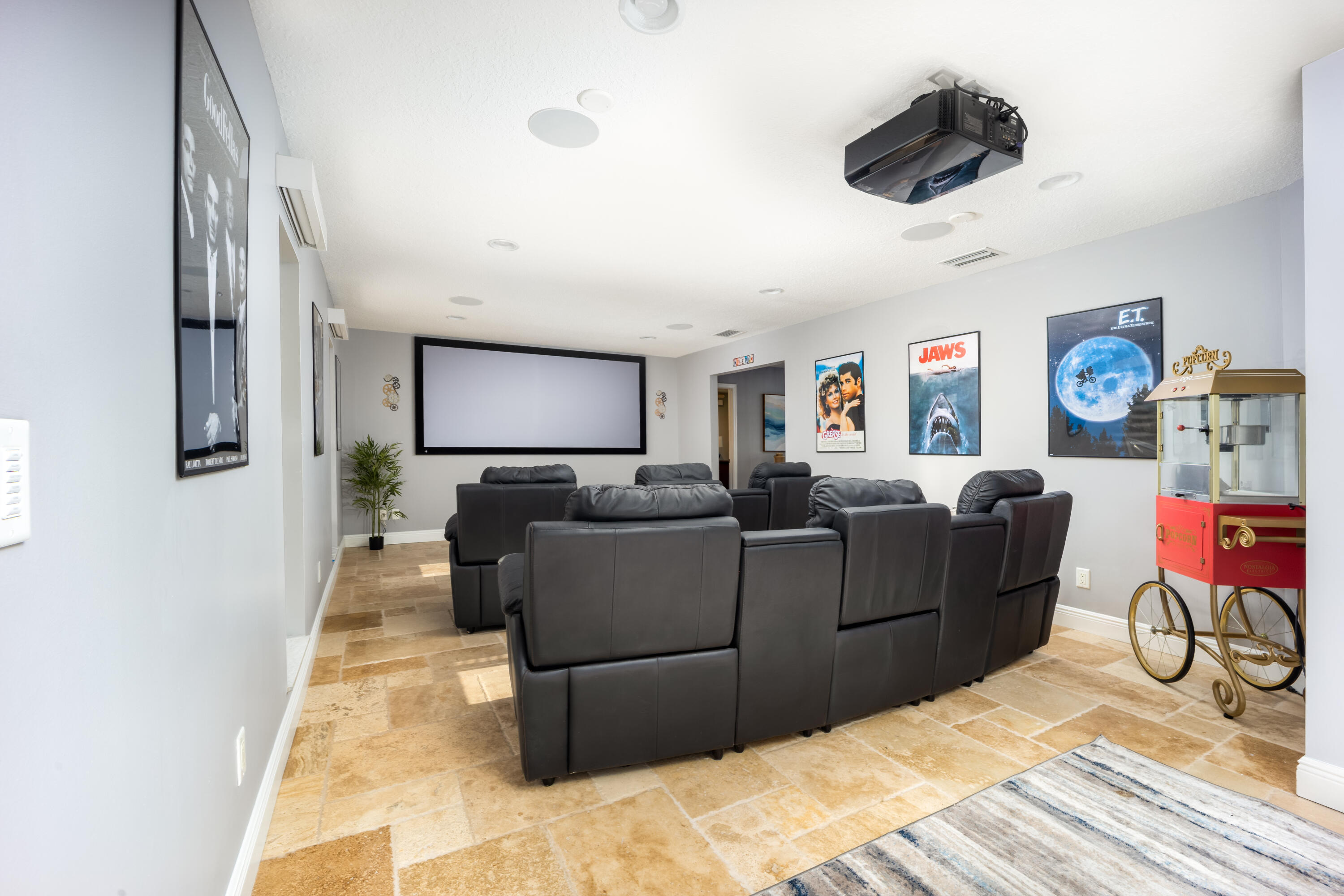 3771 Southeast Fairway West Stuart, FL 34997 - Photo 17 of 41 a living room with furniture and a flat screen tv