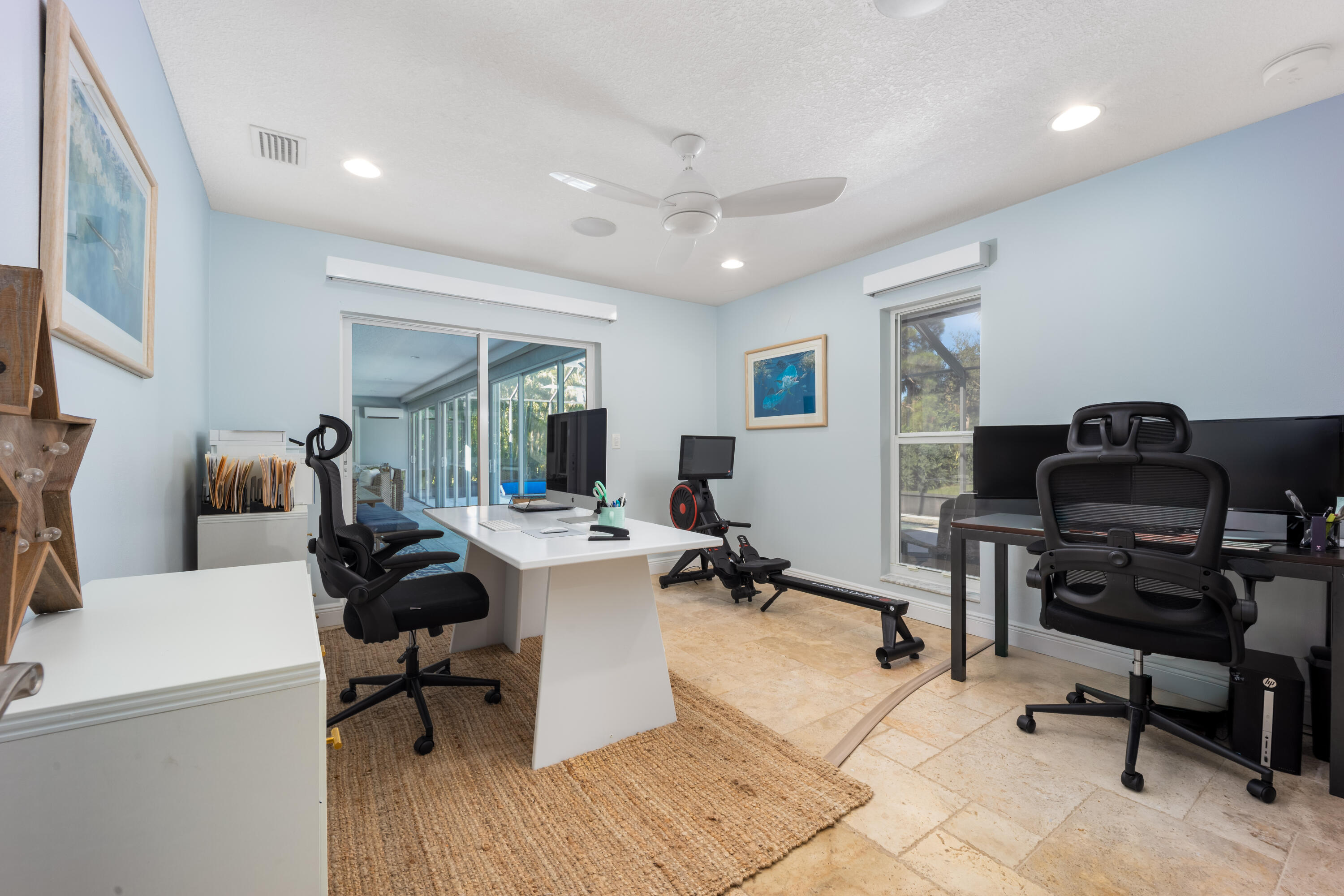 3771 Southeast Fairway West Stuart, FL 34997 - Photo 27 of 41 a view of a workspace with furniture and a window