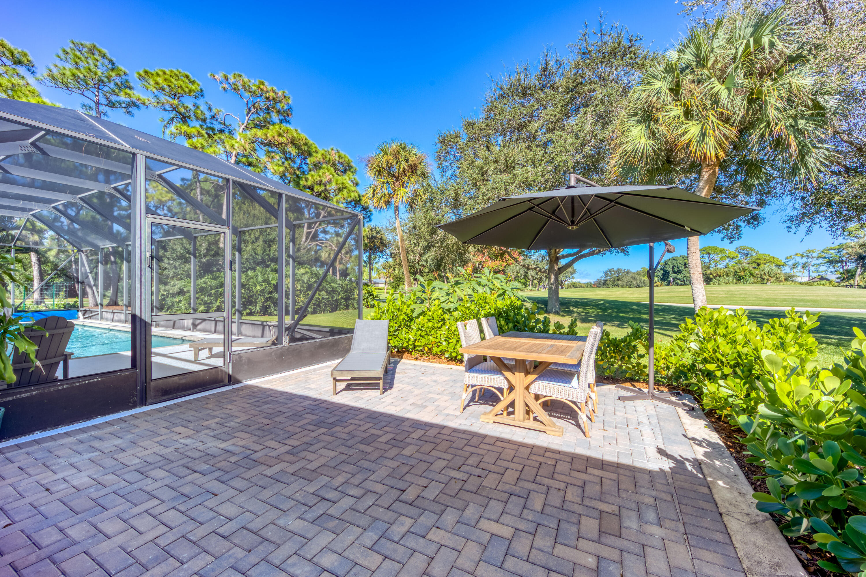 3771 Southeast Fairway West Stuart, FL 34997 - Photo 37 of 41 a garden view with a seating space