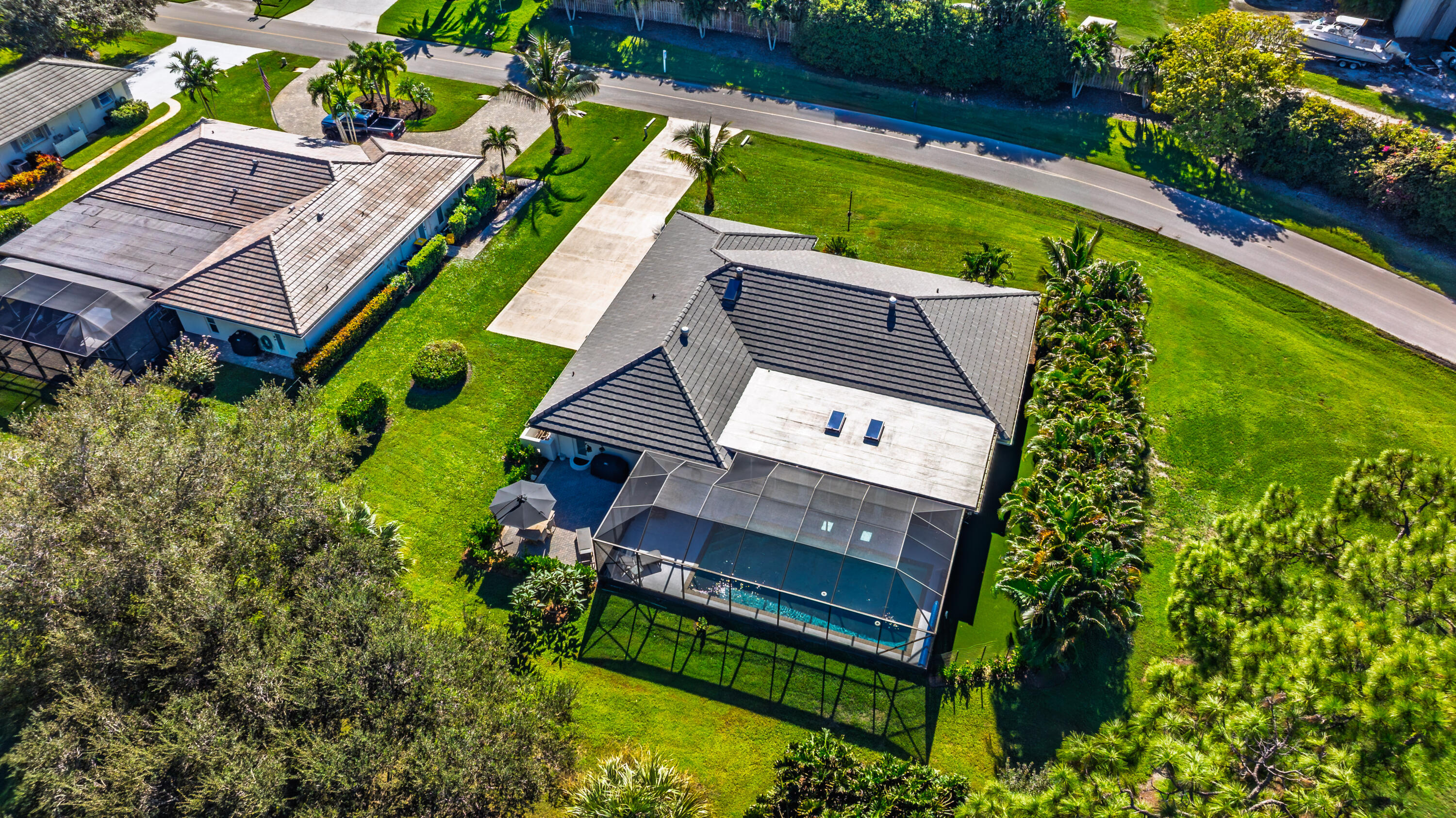3771 Southeast Fairway West Stuart, FL 34997 - Photo 7 of 41 an aerial view of a house with a garden