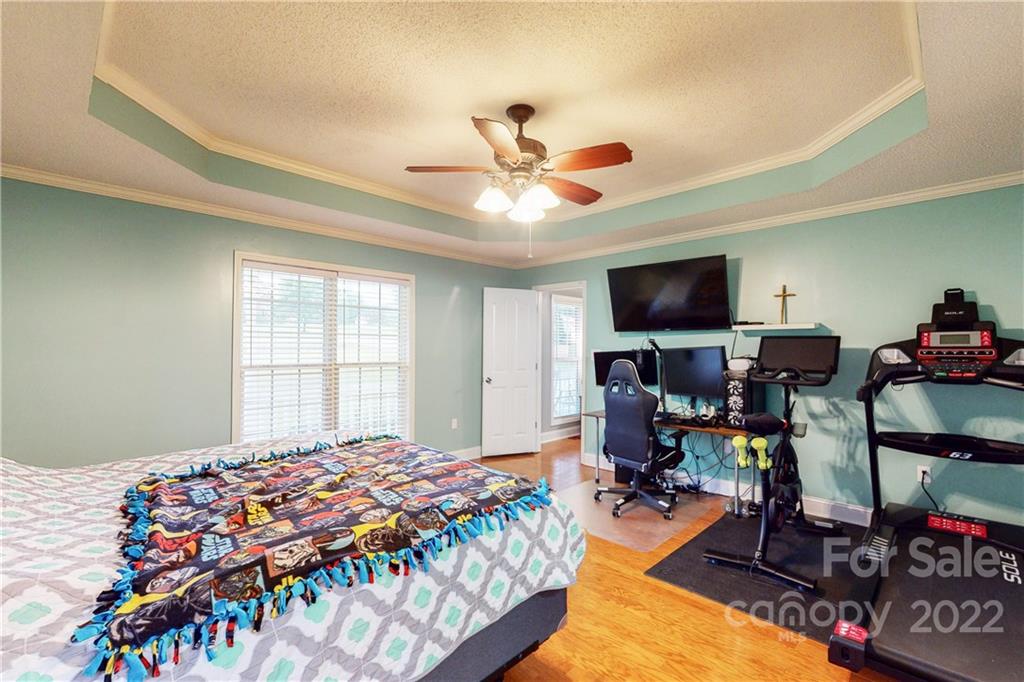 261 Pitts Road Catawba, SC 29704 - Photo 25 of 43 a bedroom with a bed and flat screen tv
