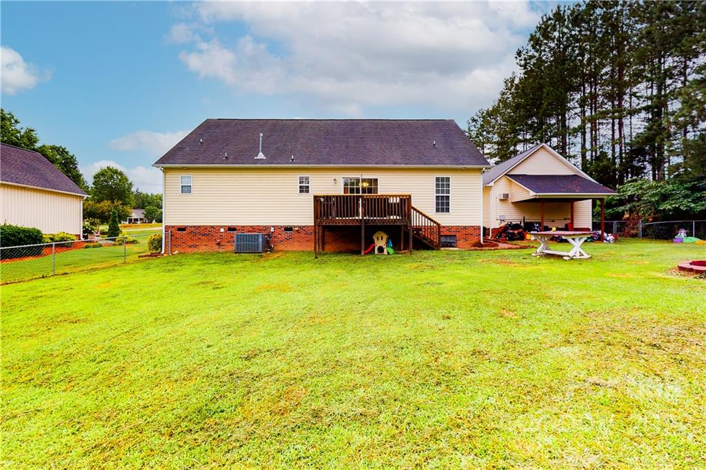 261 Pitts Road Catawba, SC 29704 - Photo 32 of 43 a view of a house with a yard and sitting area