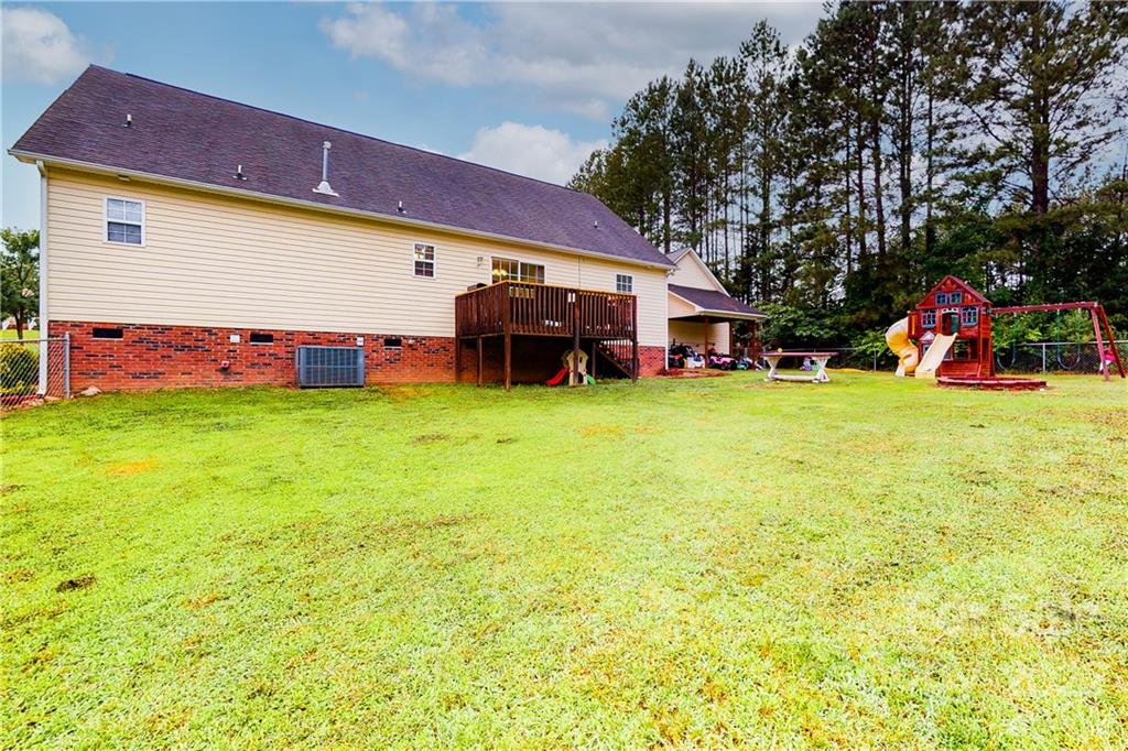 261 Pitts Road Catawba, SC 29704 - Photo 33 of 43 a view of a house with swimming pool and sitting area