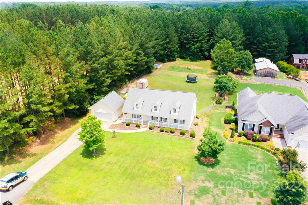 261 Pitts Road Catawba, SC 29704 - Photo 36 of 43 an aerial view of a house with a garden and swimming pool