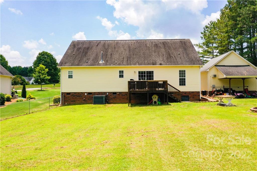 261 Pitts Road Catawba, SC 29704 - Photo 42 of 43 a view of a house with swimming pool and a yard