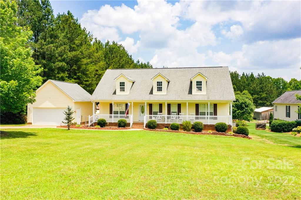 261 Pitts Road Catawba, SC 29704 - Photo 6 of 43 a view of a house with a big yard and potted plants